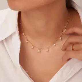 LOVCIA Opulent Elegance Pearl Tassel Necklace - Women's Gold Plated Stainless Steel Chain