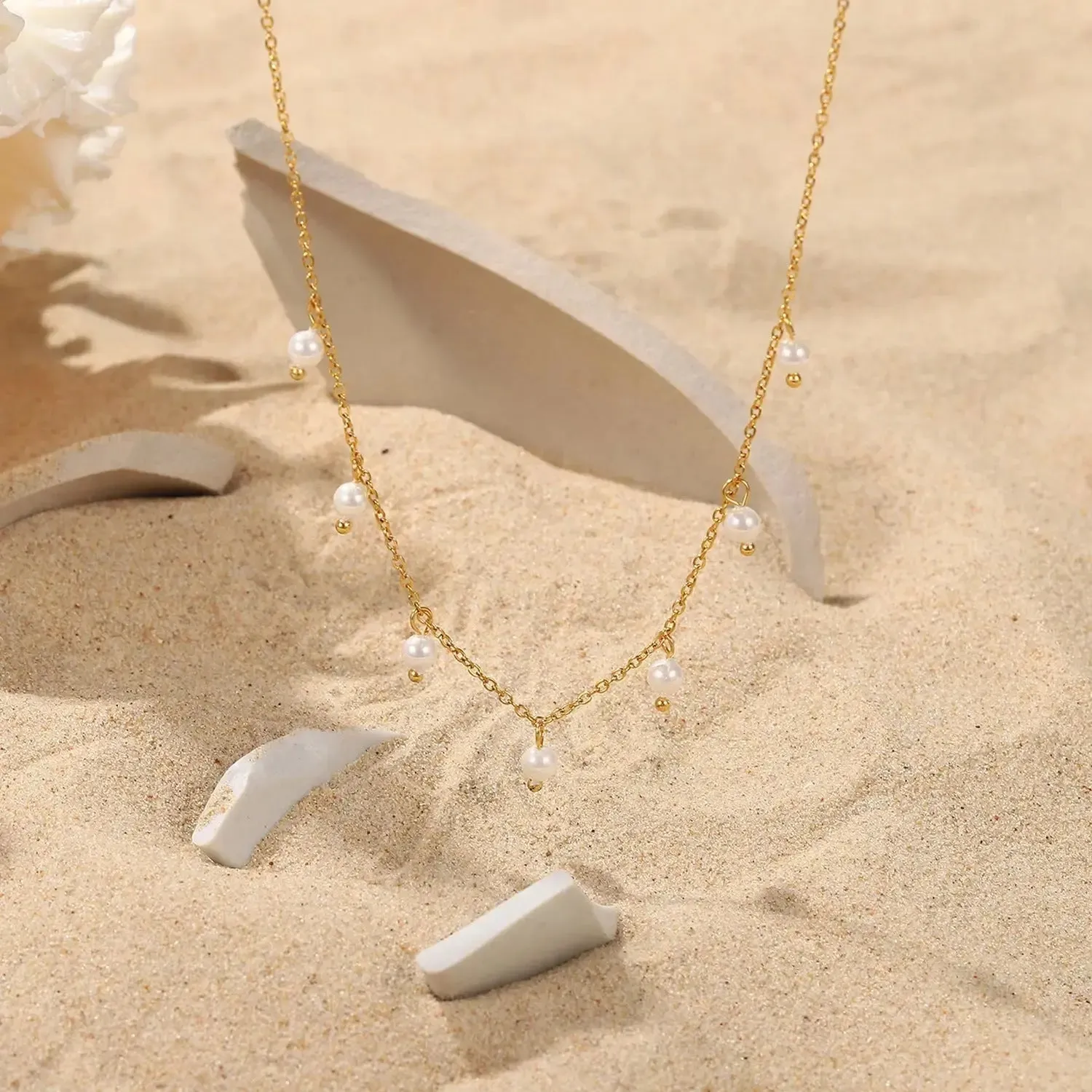 LOVCIA Opulent Elegance Pearl Tassel Necklace - Women's Gold Plated Stainless Steel Chain