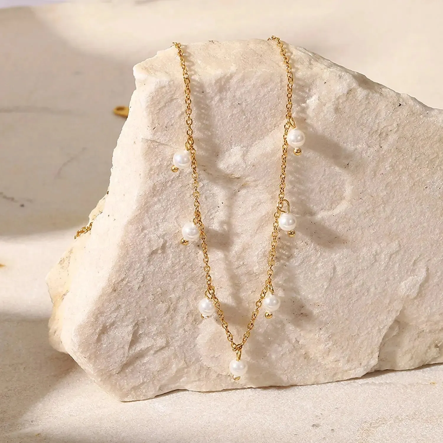 LOVCIA Opulent Elegance Pearl Tassel Necklace - Women's Gold Plated Stainless Steel Chain